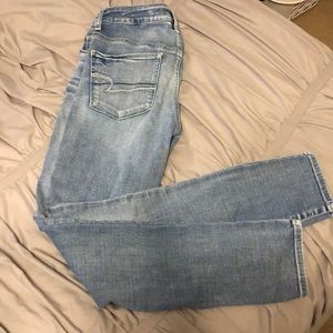 AE High-rise “super stretch” skinny jeans